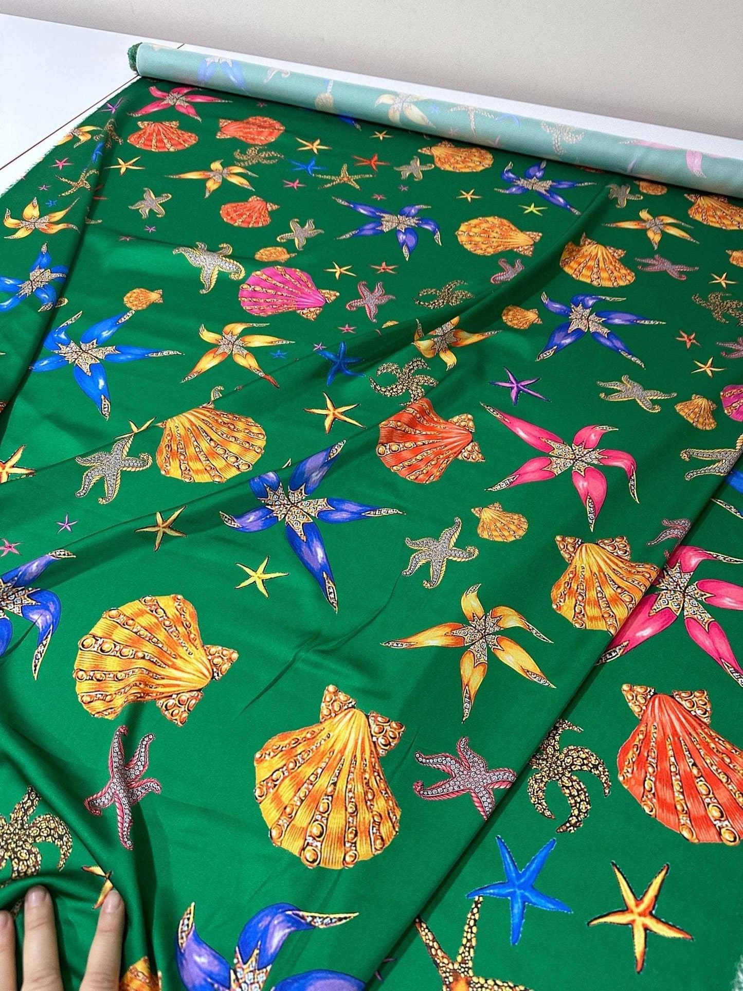 Sea Shell Pattern Green Fabric Sold by Metre