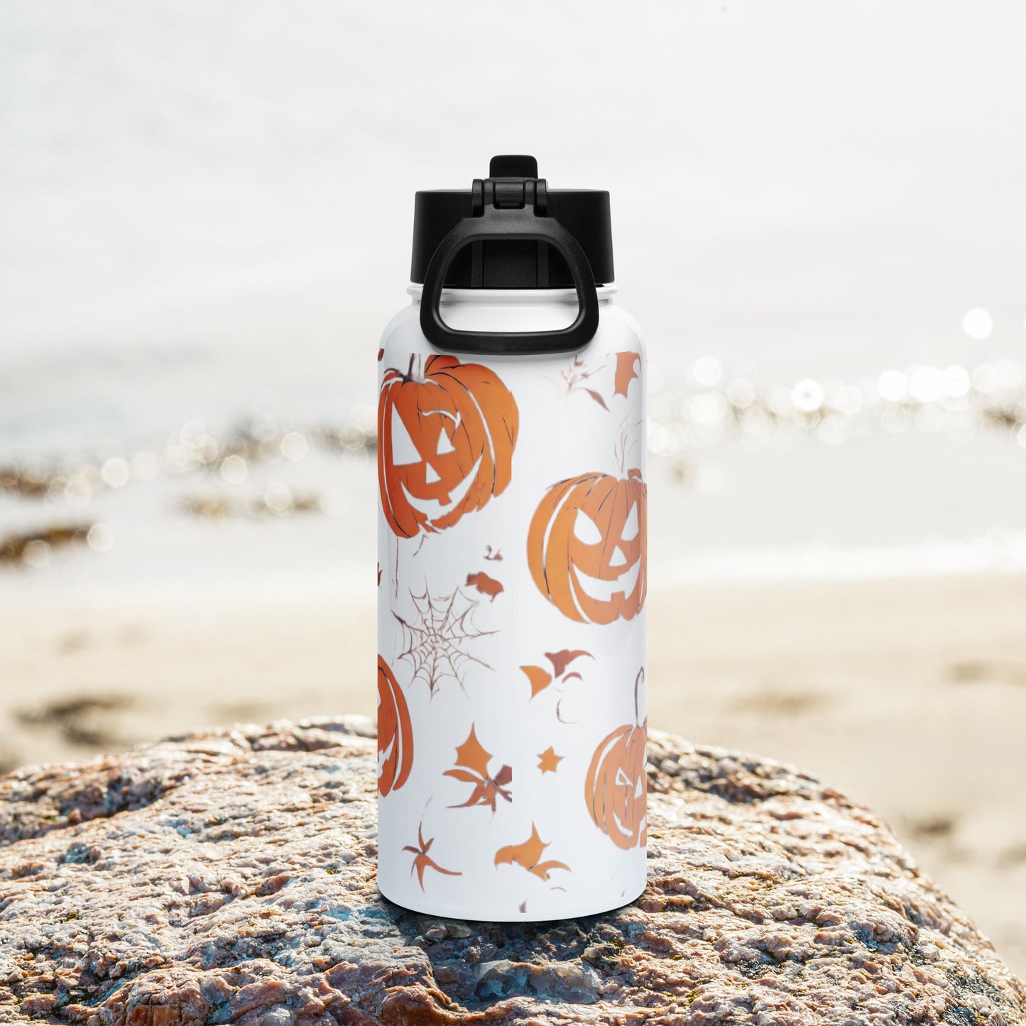 Stainless steel water bottle with a straw lid