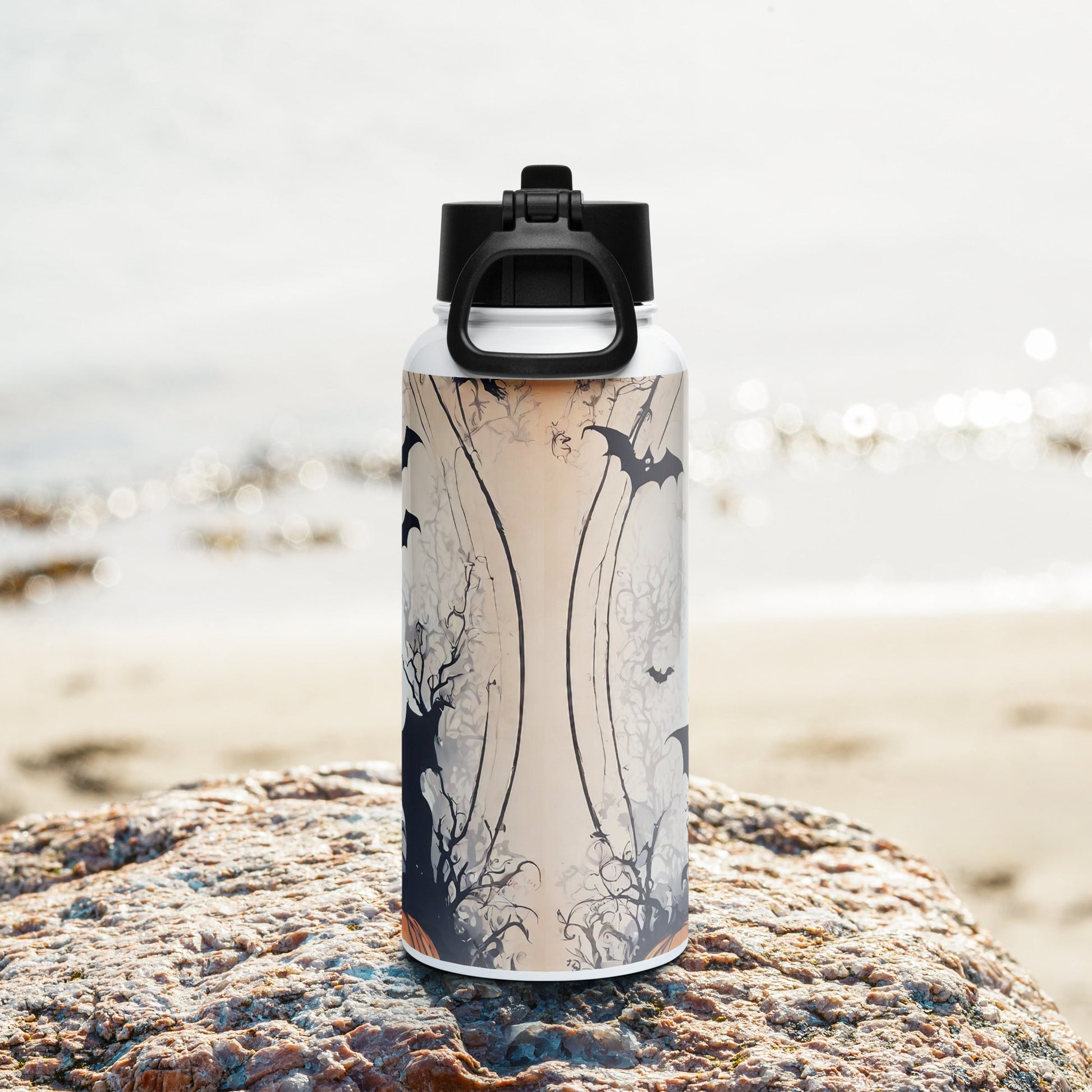 Stainless steel water bottle with a straw lid