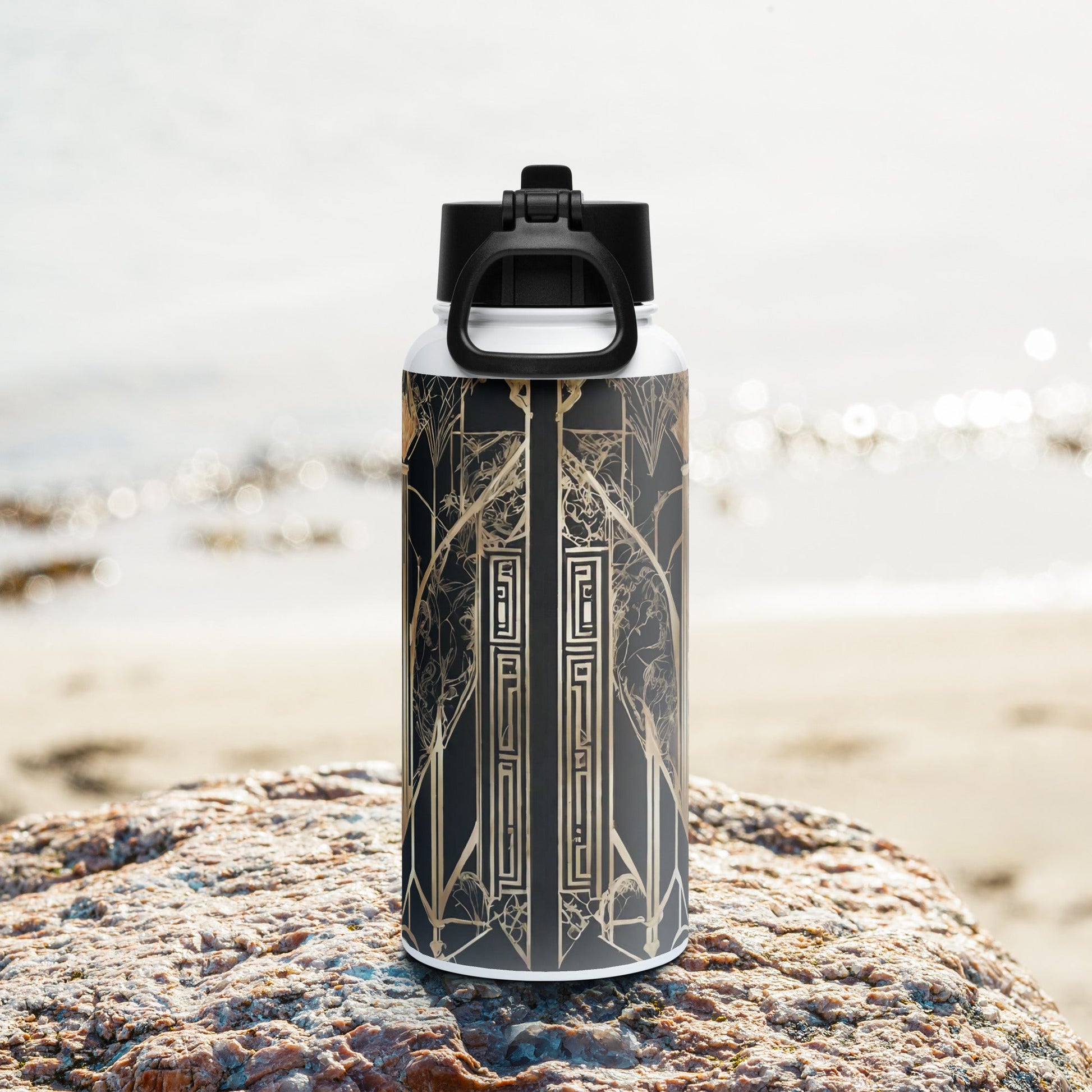 Stainless steel water bottle with a straw lid