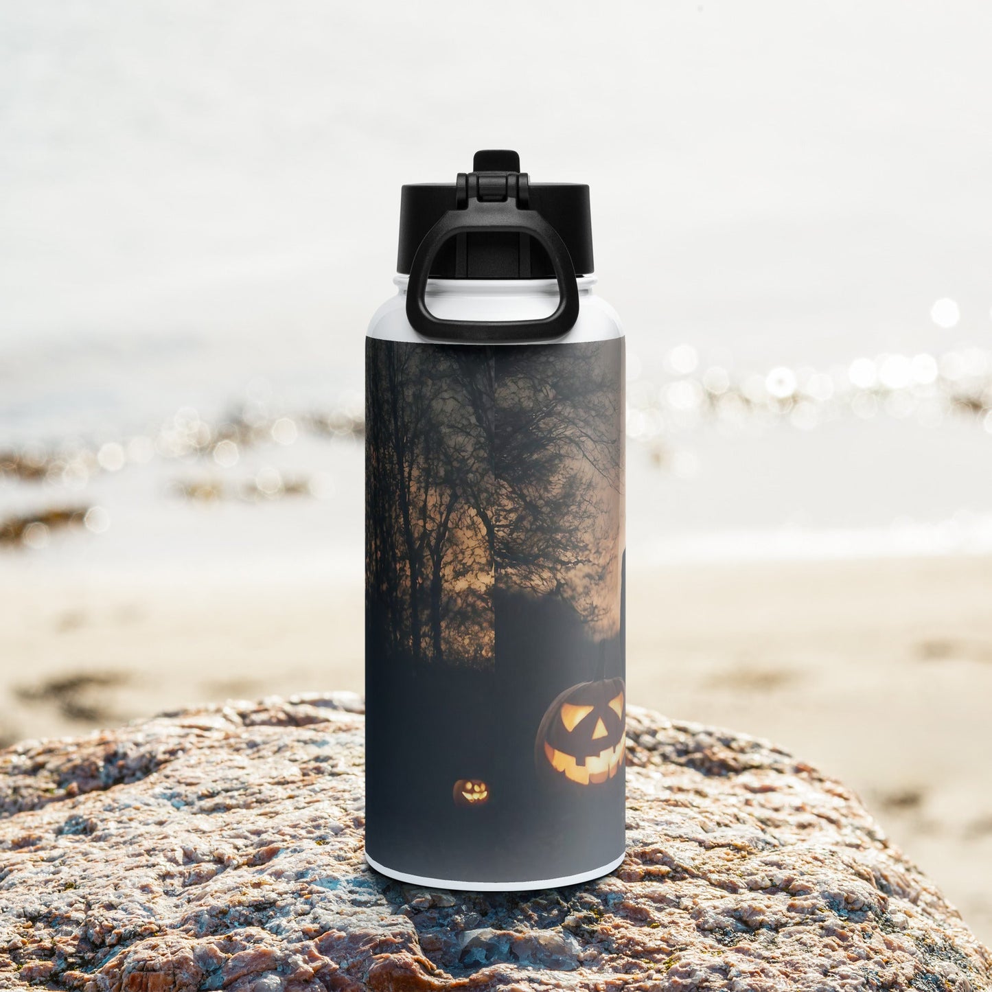 Stainless steel water bottle with a straw lid