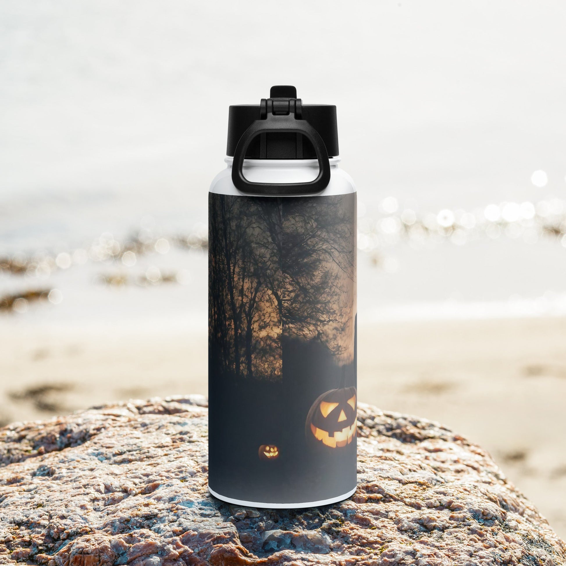 Stainless steel water bottle with a straw lid