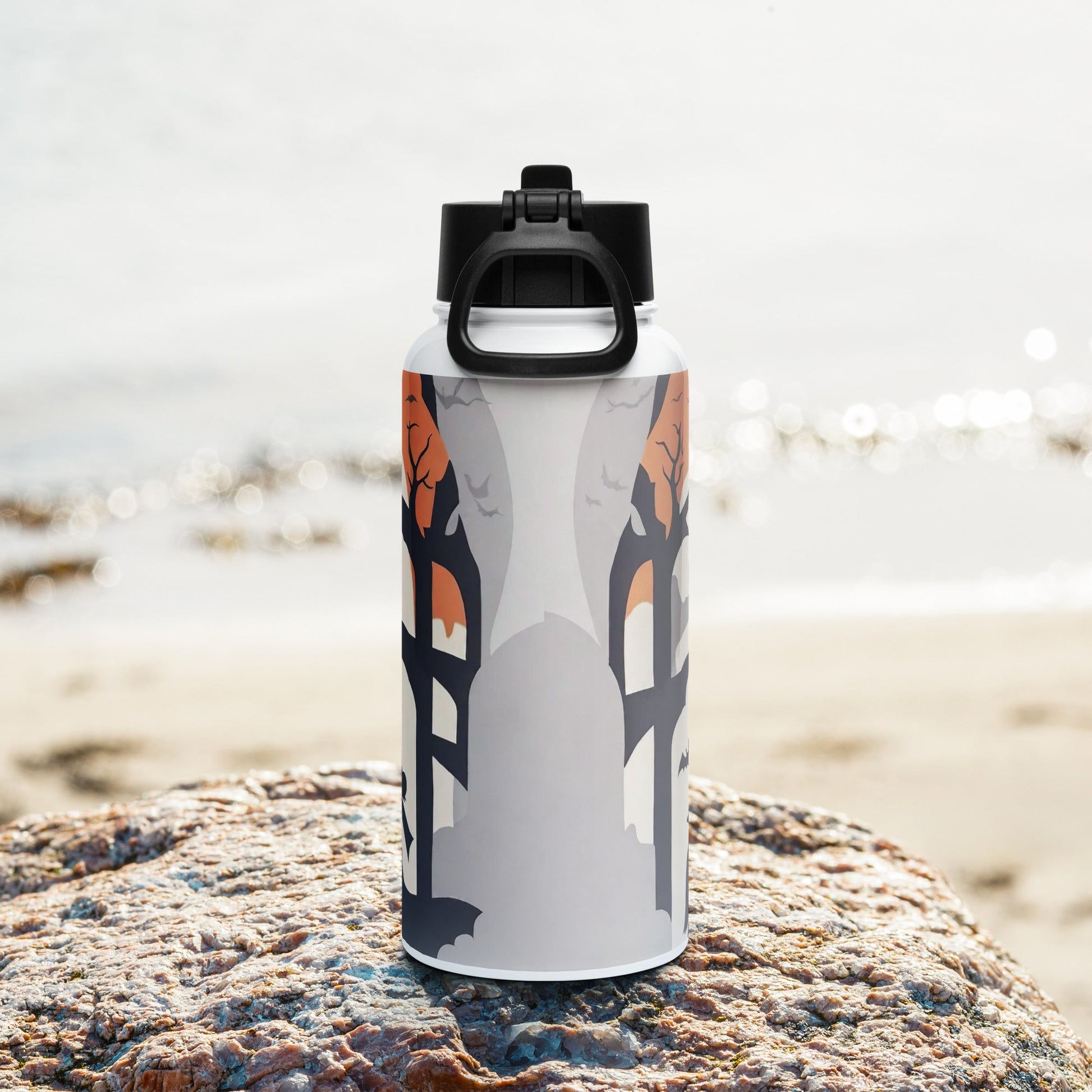 Stainless steel water bottle with a straw lid