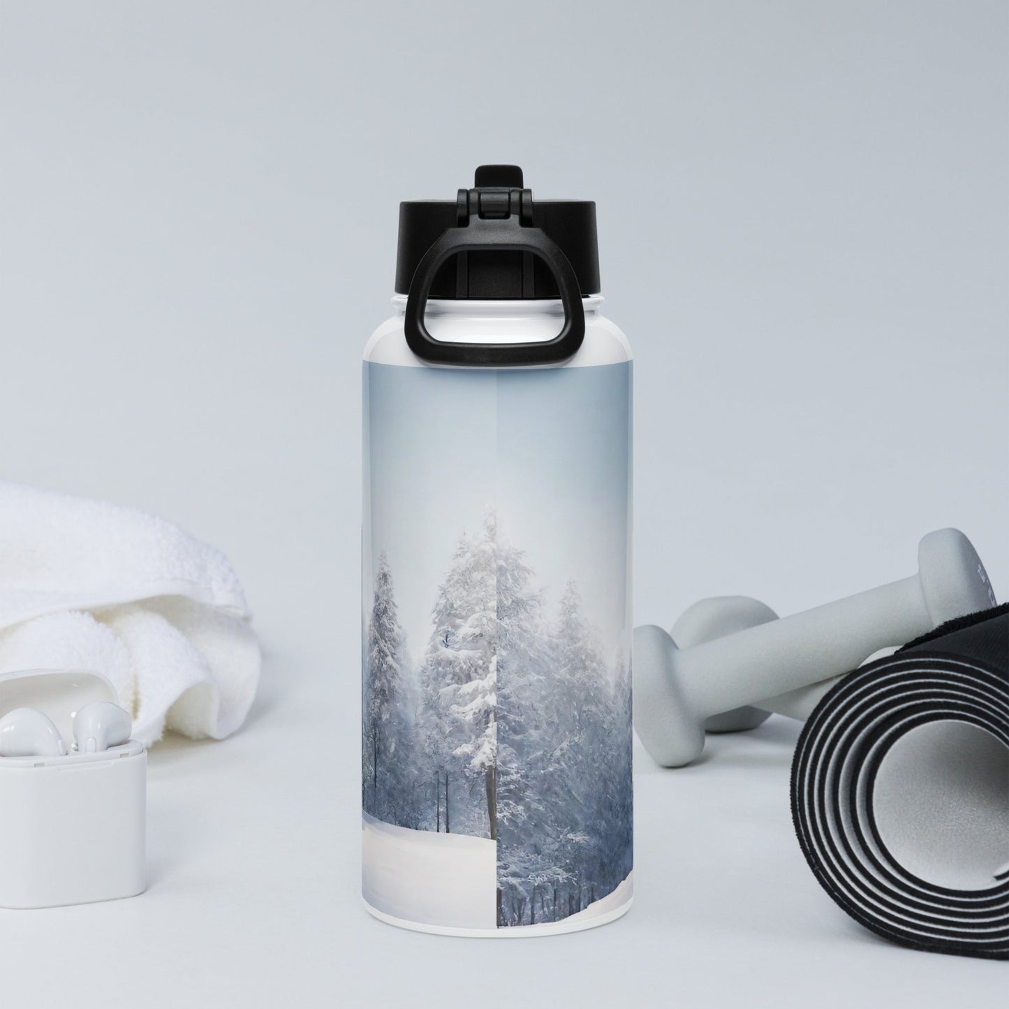 Stainless steel water bottle with a straw lid