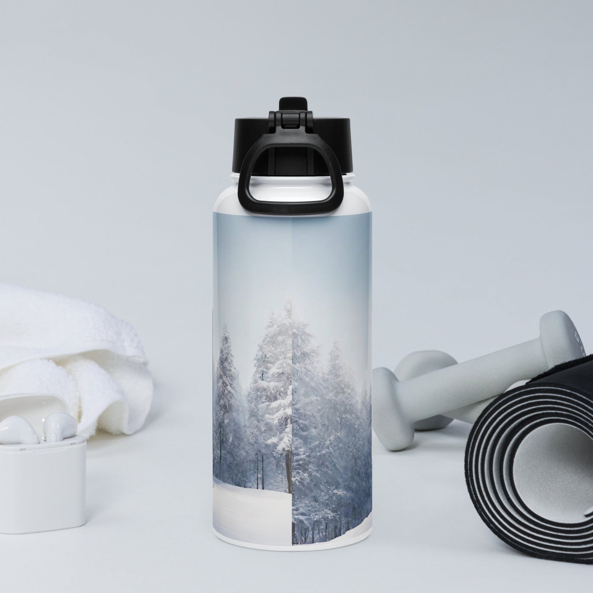 Stainless steel water bottle with a straw lid