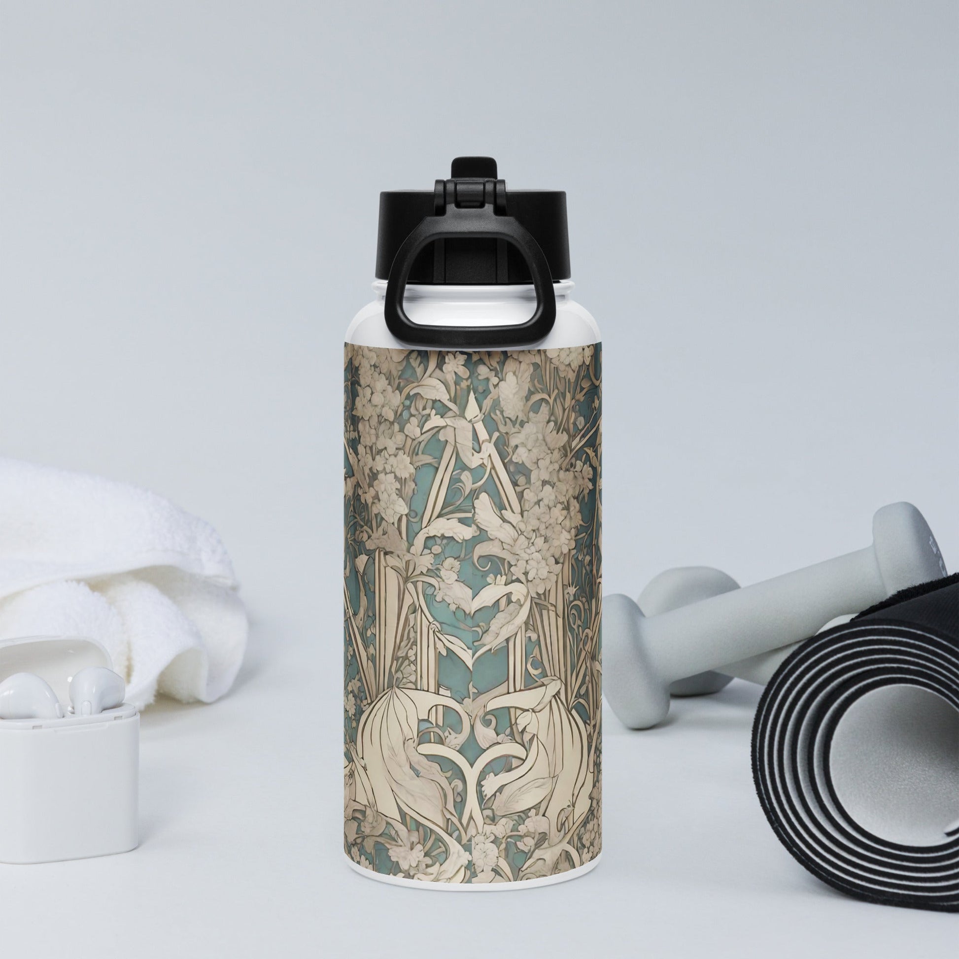 Stainless steel water bottle with a straw lid