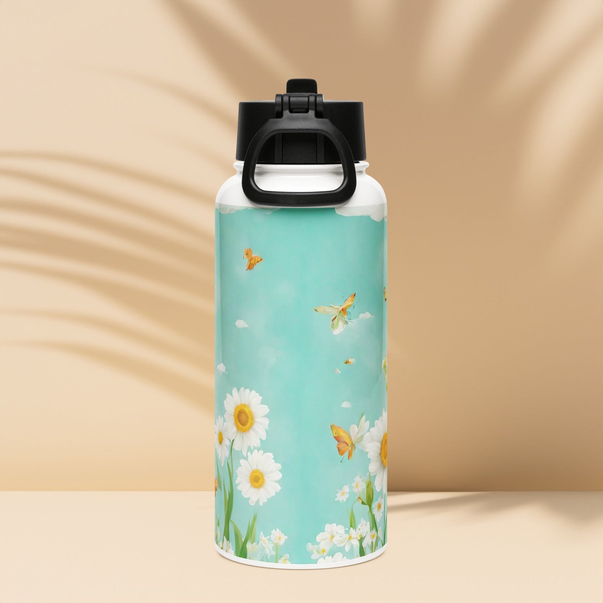 Stainless steel water bottle with a straw lid