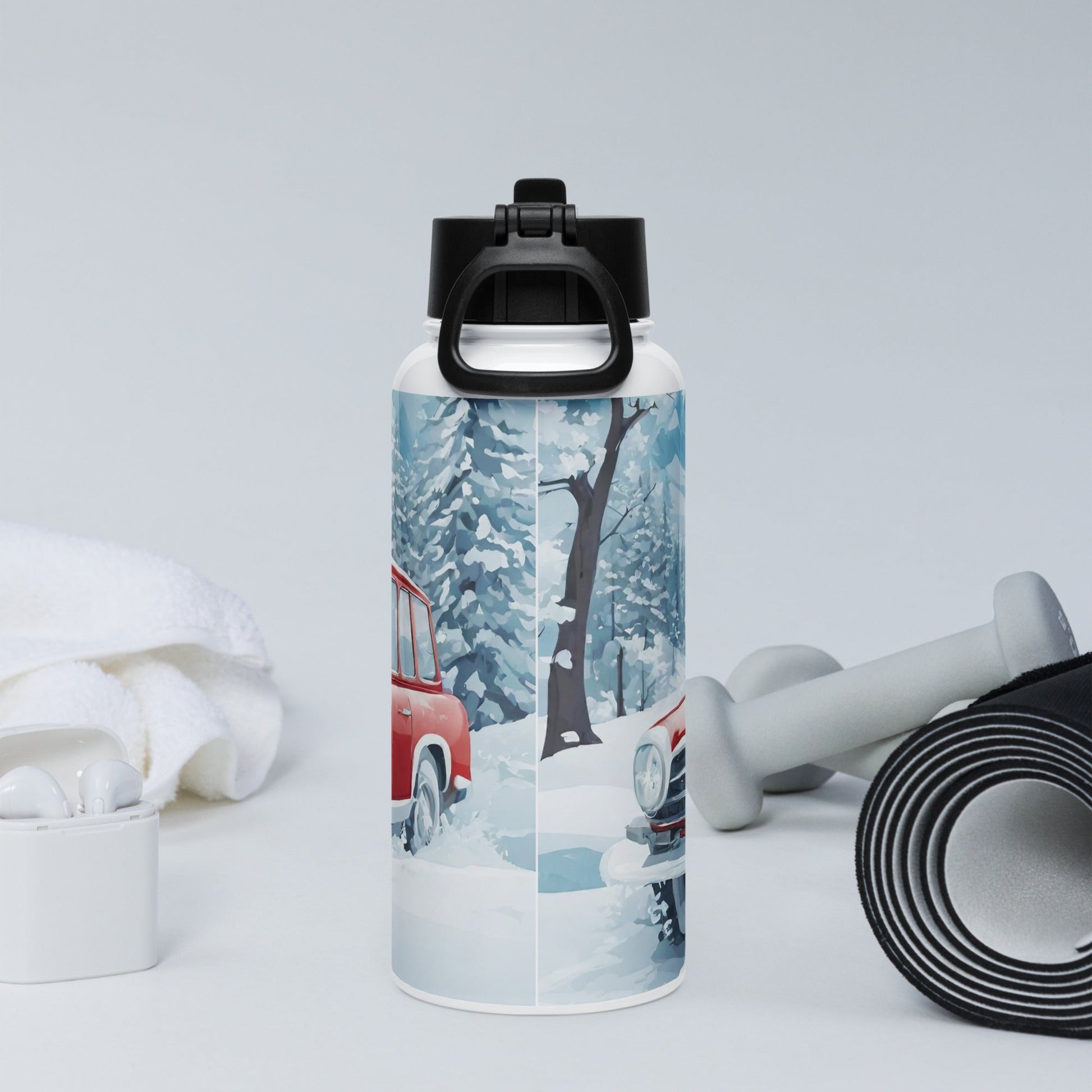 Stainless steel water bottle with a straw lid