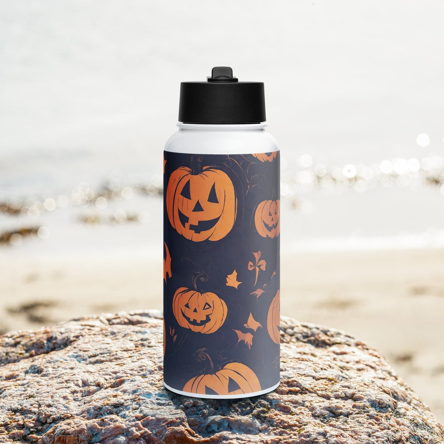 Stainless steel water bottle with a straw lid