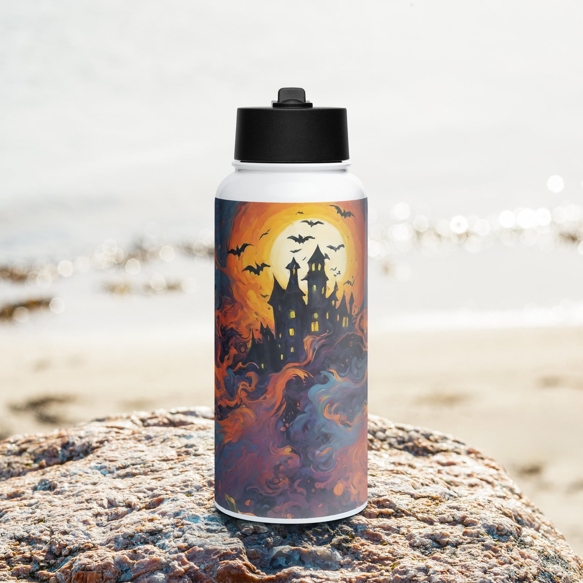 Stainless steel water bottle with a straw lid