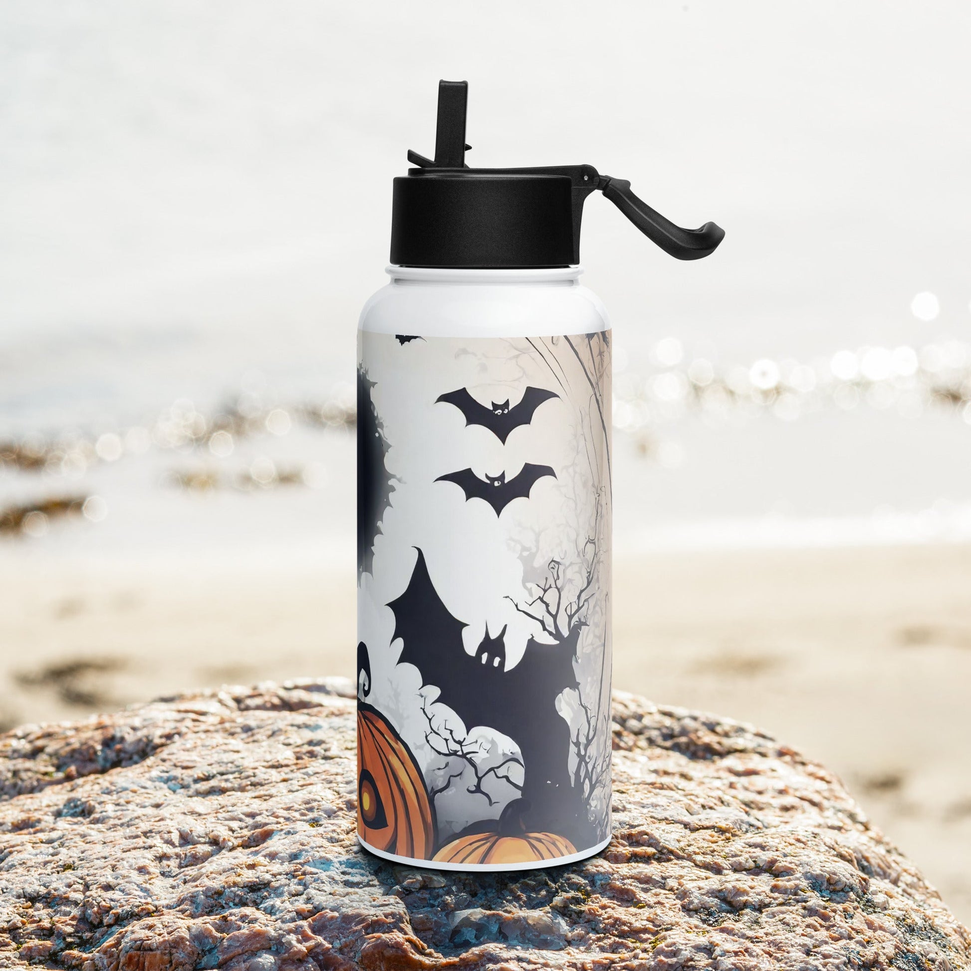 Stainless steel water bottle with a straw lid