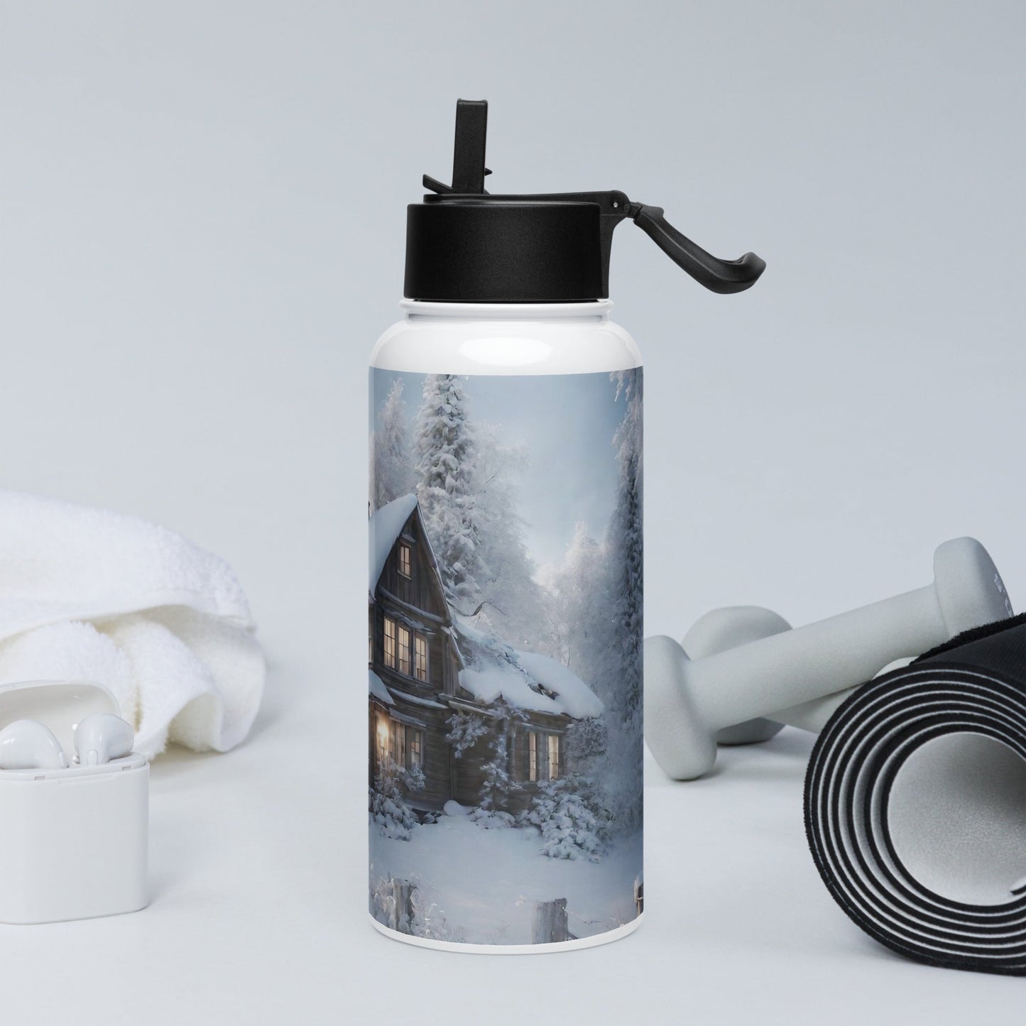 Stainless steel water bottle with a straw lid
