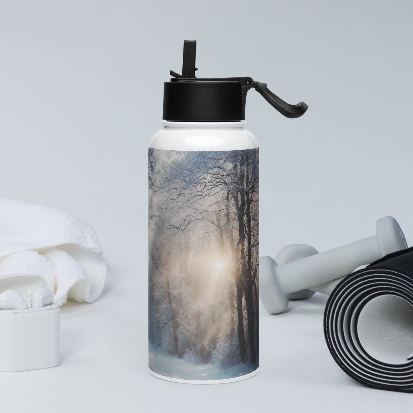 Stainless steel water bottle with a straw lid