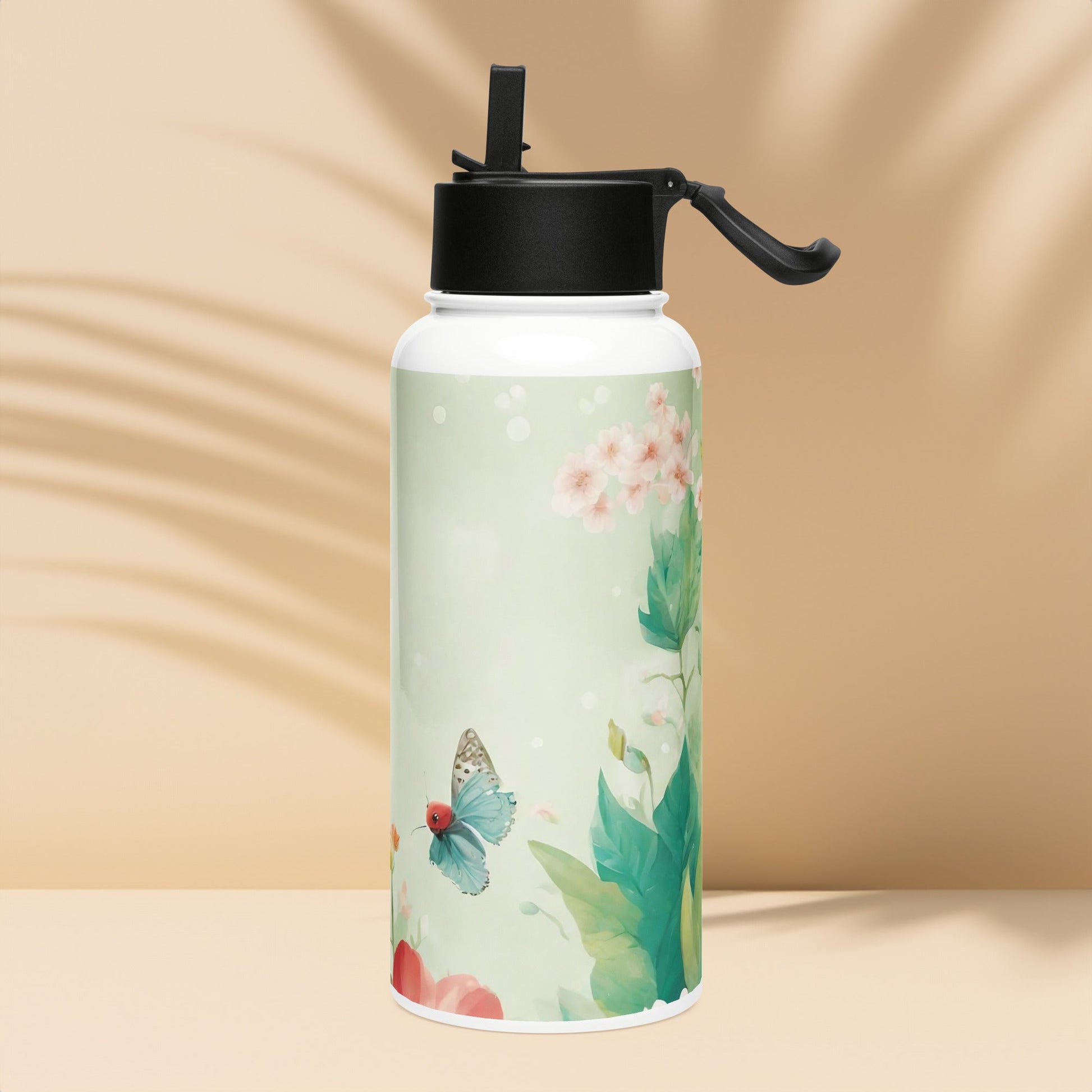 Stainless steel water bottle with a straw lid