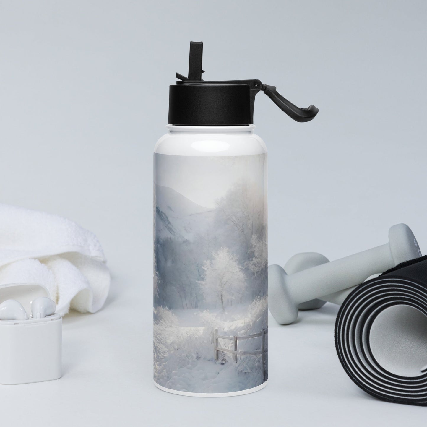 Stainless steel water bottle with a straw lid