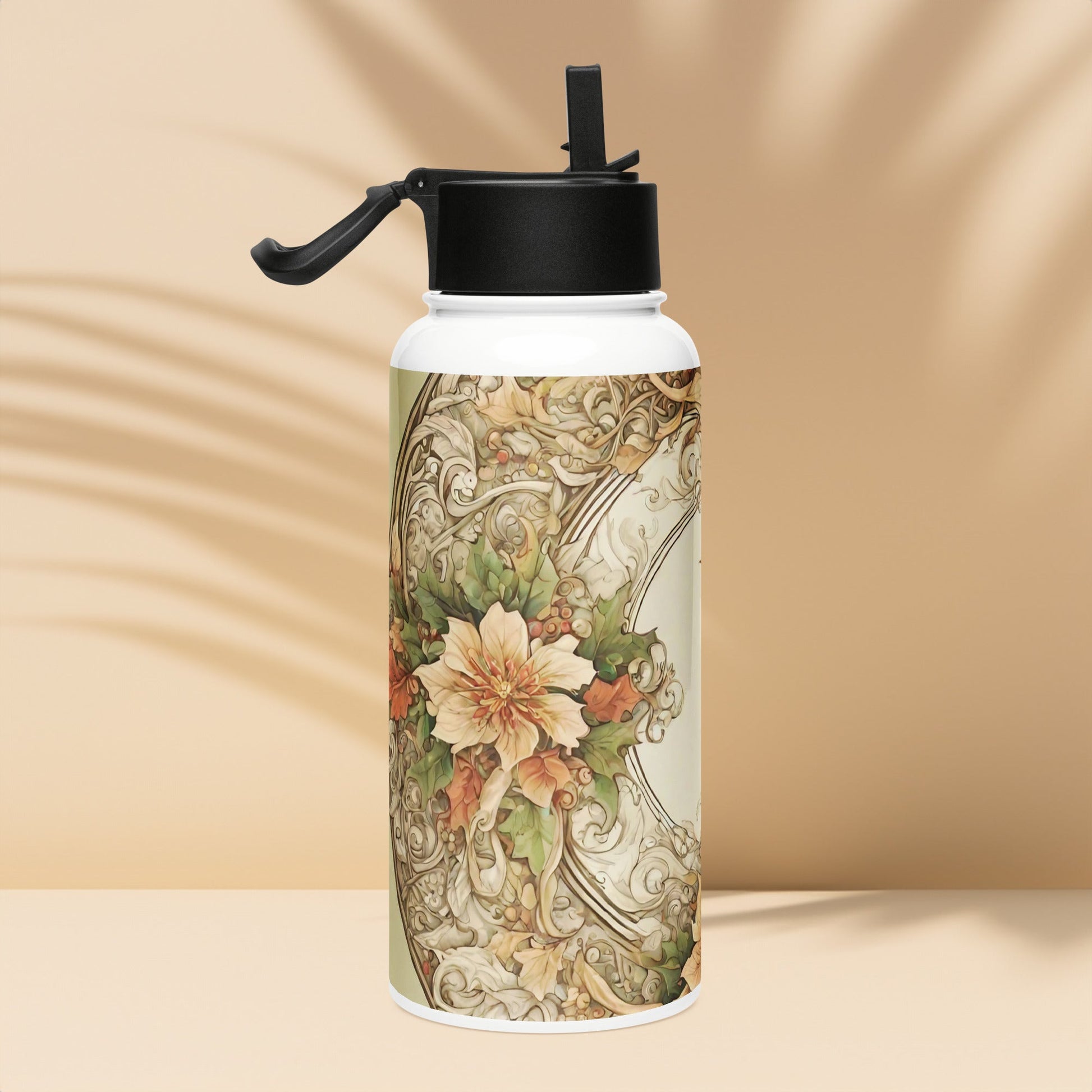 Stainless steel water bottle with a straw lid