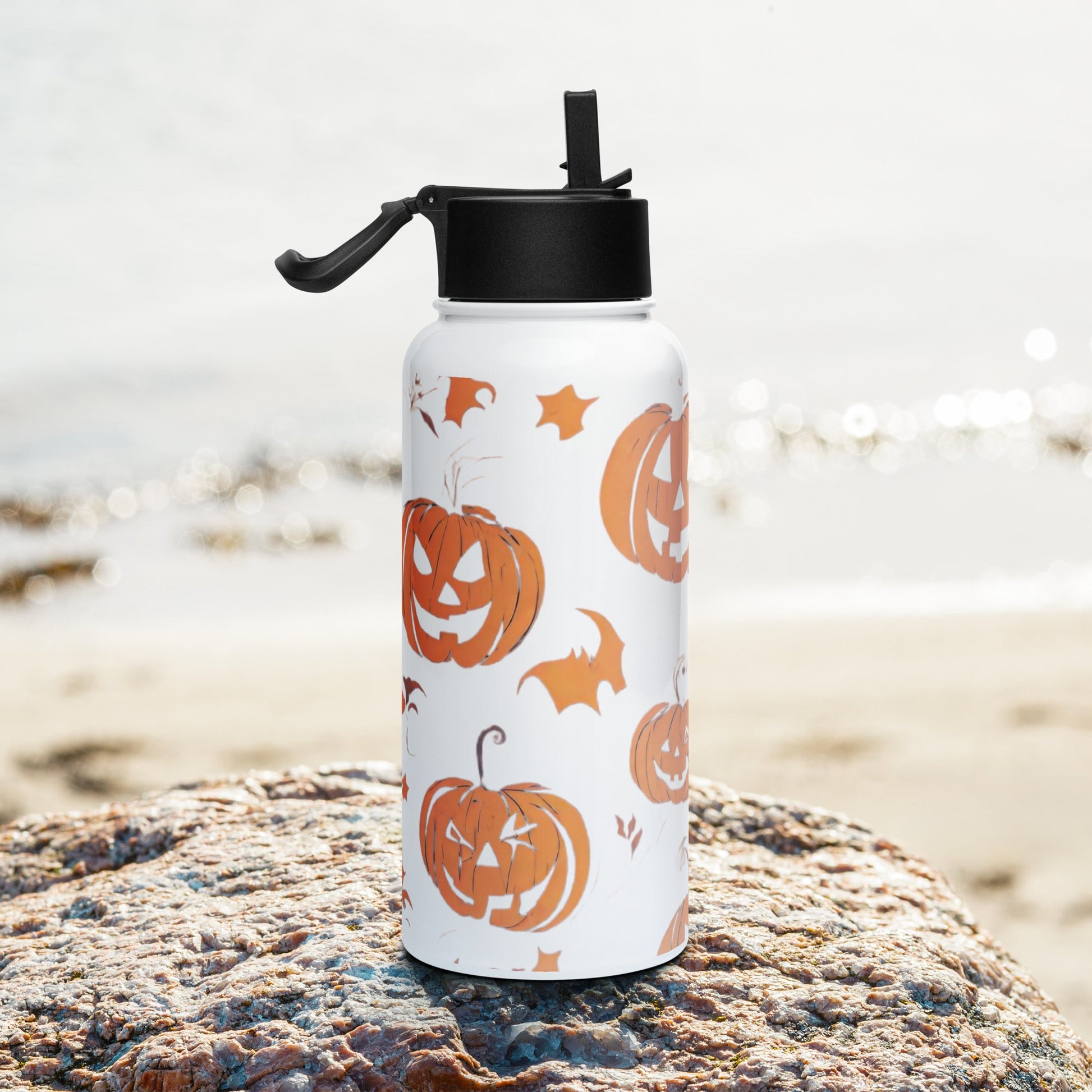 Stainless steel water bottle with a straw lid