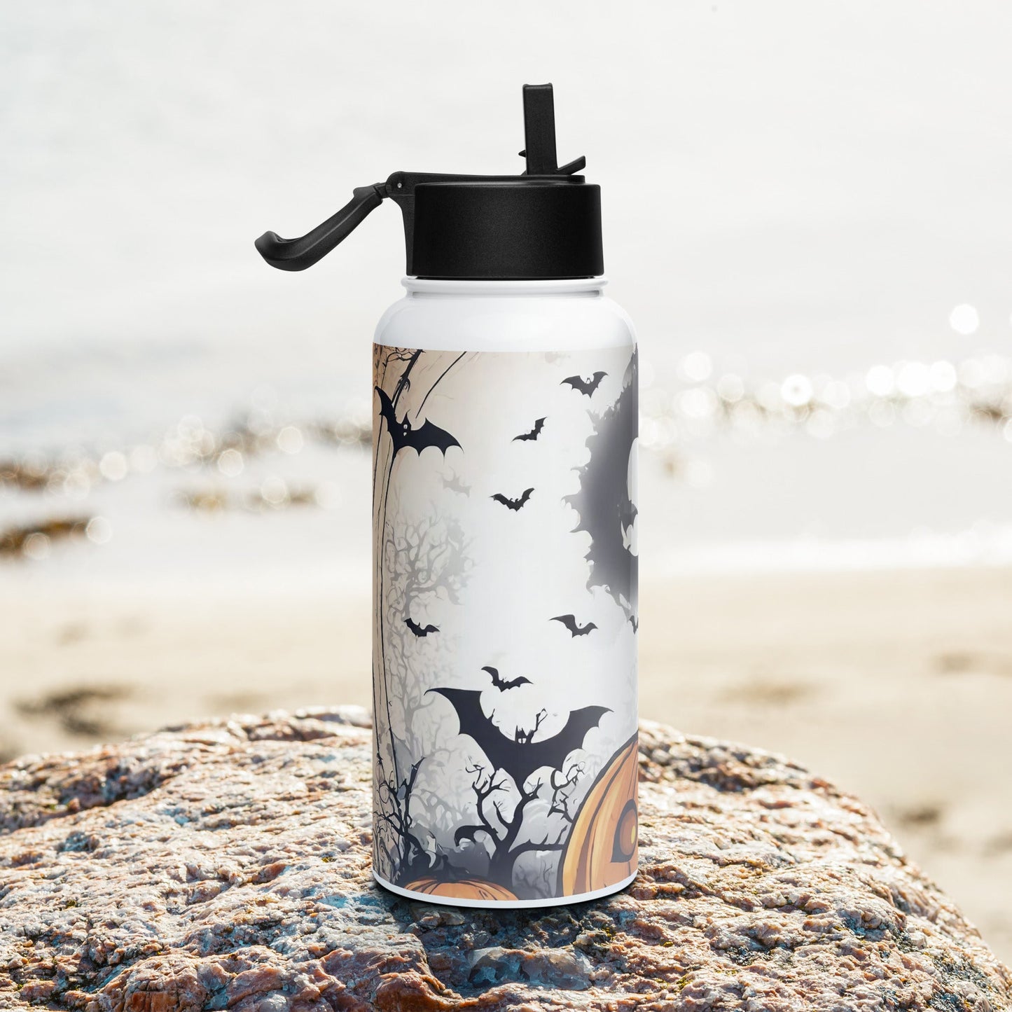 Stainless steel water bottle with a straw lid