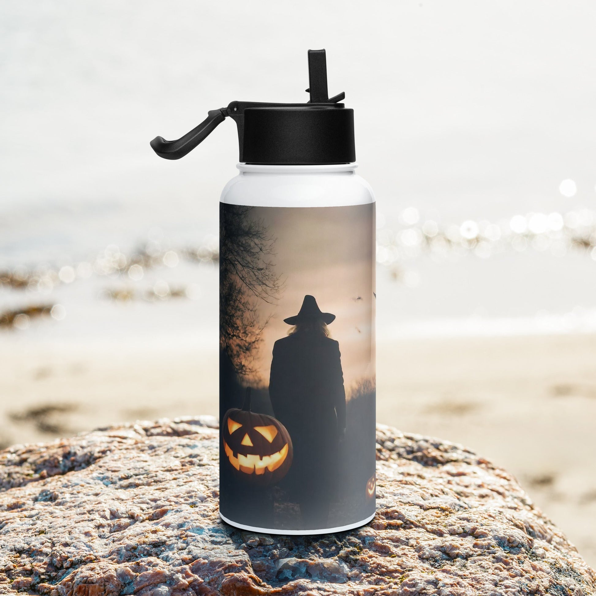 Stainless steel water bottle with a straw lid