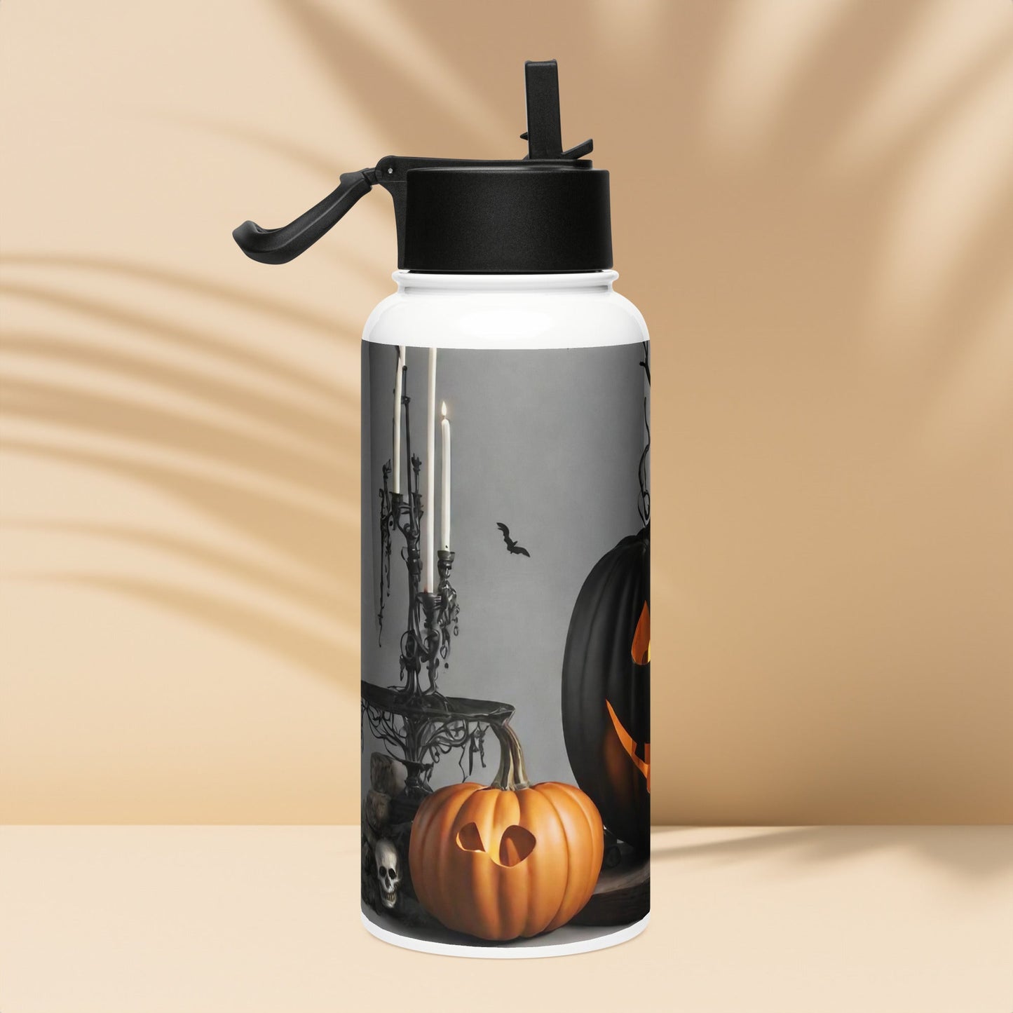 Stainless steel water bottle with a straw lid