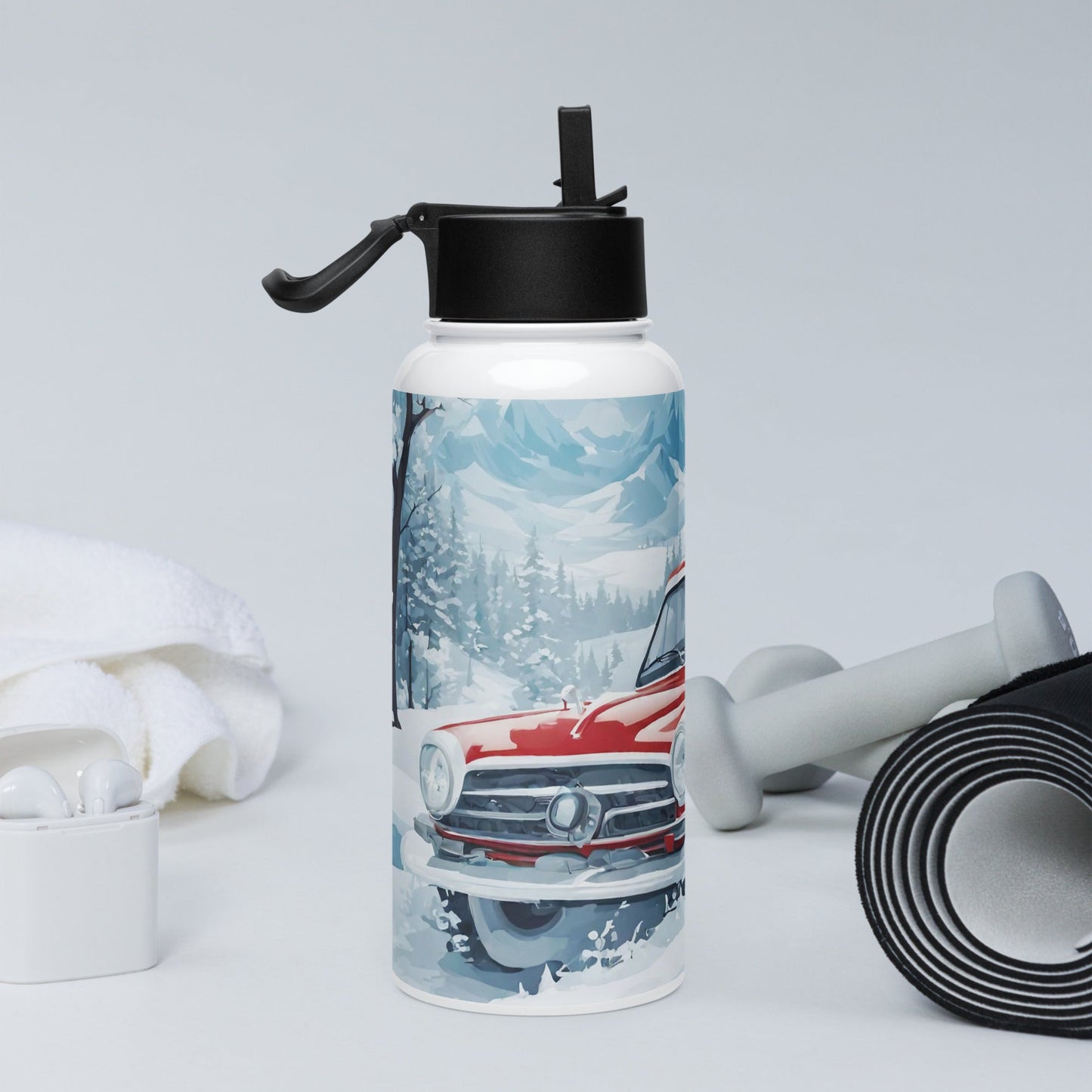 Stainless steel water bottle with a straw lid