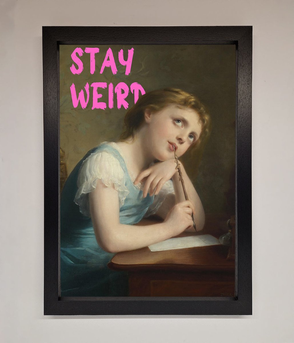Stay Weird Framed Print