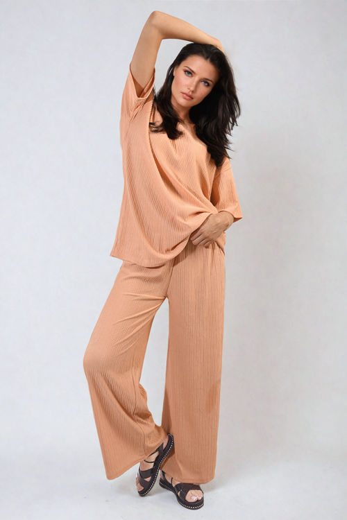 https://images.avasam.com/?w=500&url=https://avasamnew.s3.amazonaws.com/live//ikrush-daniela-ribbed-oversized-top-and-drawstring-wide-leg-trouser-co-ord-set-1722433396538741.png